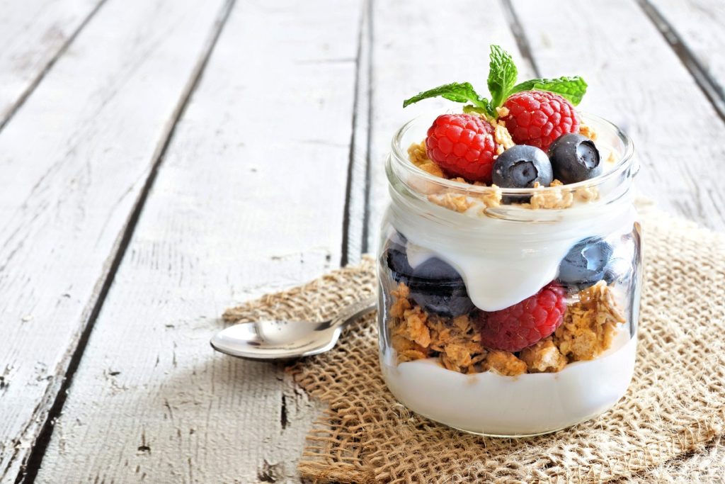 healthy yogurt and fruits on a jar