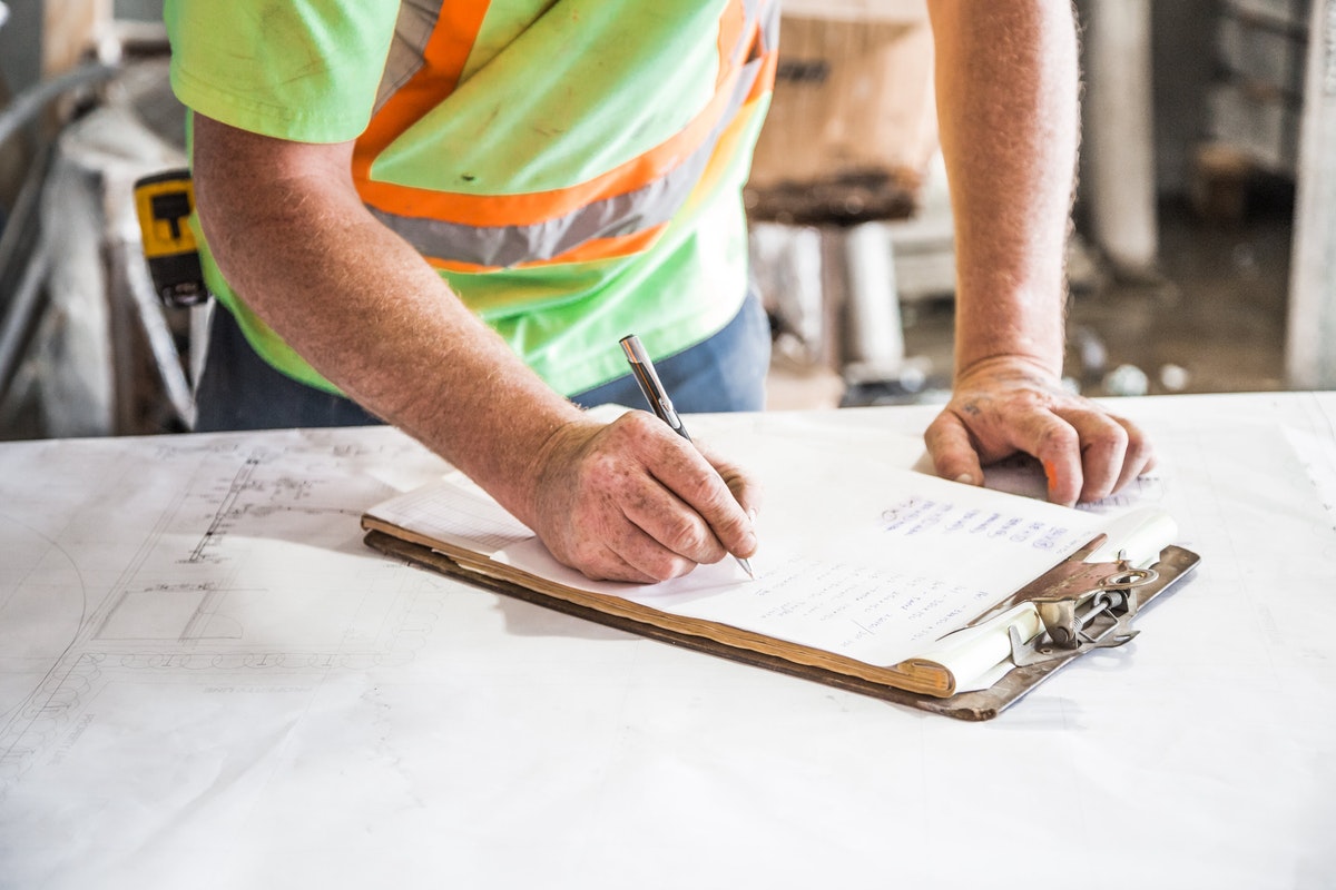 employee signing papers