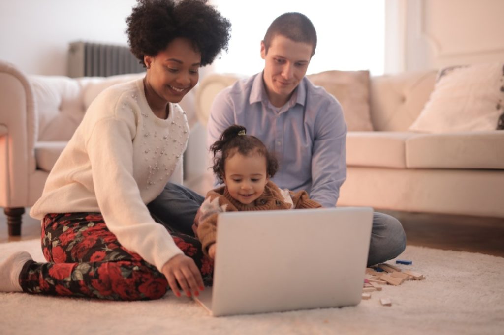 family using a laptop