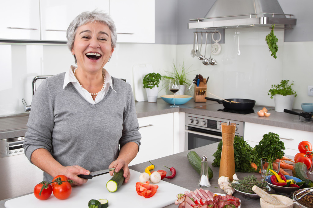 old woman cooking